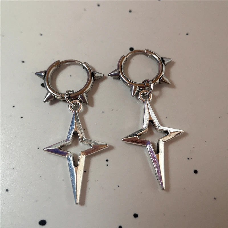 Minimalist crucifix Star earrings with a sleek, polished metal finish.