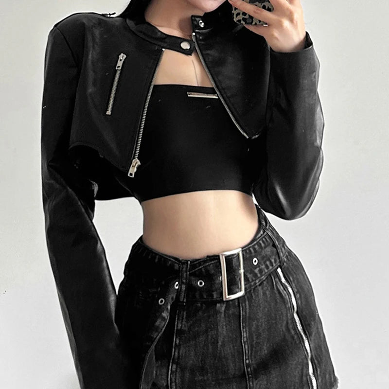 A black cropped cyberpunk jacket displayed on a mannequin, featuring a slim fit, zip-up closure, and an asymmetrical hem.