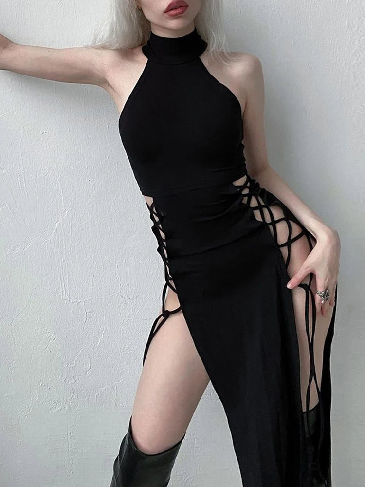 Model wearing a gothic high-slit dress, showcasing the body-hugging fit and sleek A-line silhouette.