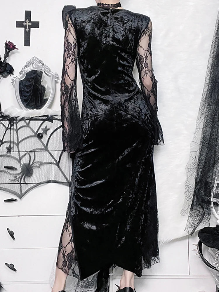 The back of a gothic black velvet dress, showcasing its elegant slim-fit design and lace detailing.