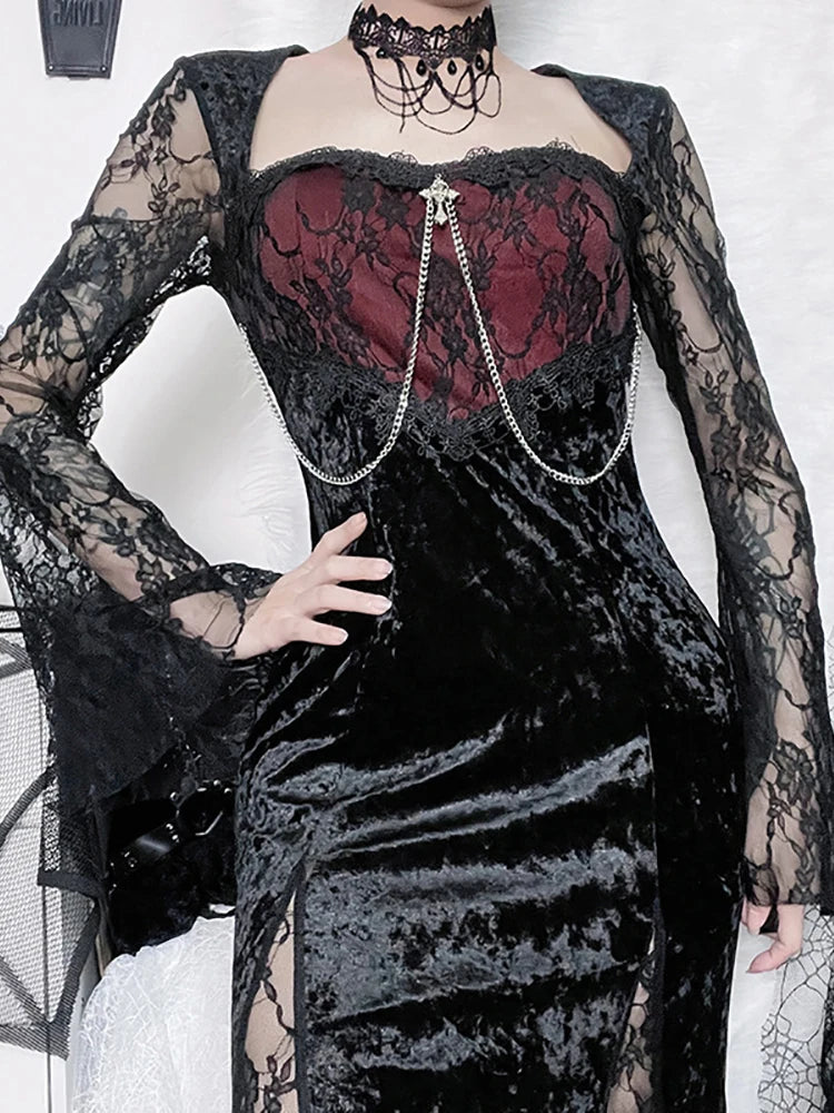 A black velvet midi dress with a square neckline and lace patchwork, exuding gothic sophistication.