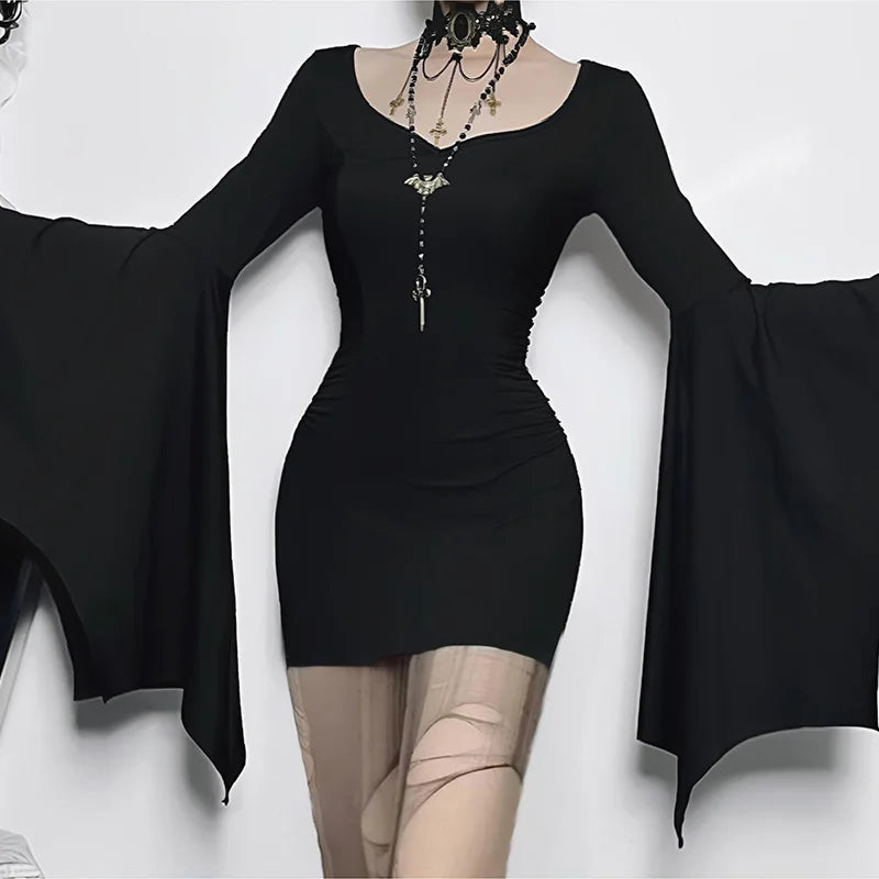 Model wearing the Midnight Enchantress Batwing Sleeve Mini Dress, paired with gothic accessories for a dark and sultry look